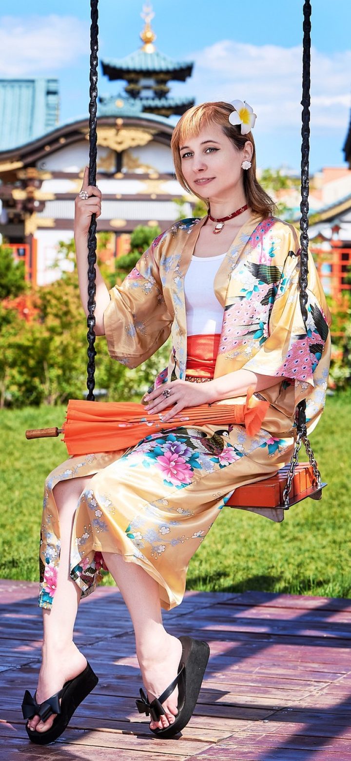 k937.com App 专题索引列表，每条带日期标签与标题，浅色留白排版，阅读起来层次分明